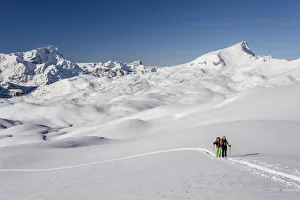 Ski mountaineers during the ascent of Mt Seekofel in the Fanes-Sennes-Prags Nature Park of the Dolomites Ski mountaineers during the ascent of Mt Seekofel in the Fanes-Sennes-Prags Nature Park of the Dolomites