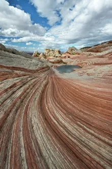 Small pool and geological formations found at Vermillion Cliffs National Monument Small pool and geological formations found at Vermillion Cliffs National Monument
