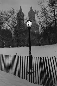Images Dated 9th June 2004: Small wooden fence and a lamppost in a snowy park