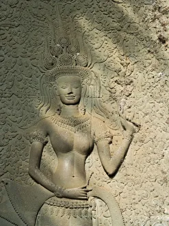 Only one smilely apsara sculpture from 1800+ apsara at Angkor wat , siem reap , cambodia Only one smilely apsara sculpture from 1800+ apsara at Angkor wat , siem reap , cambodia
