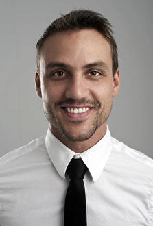 Smiling young man wearing a shirt and a tie, portrait Smiling young man wearing a shirt and a tie, portrait