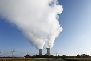 Smoke erupting from cooling towers of a nuclear power plant, Grafenrheinfeld, Schweinfurt Smoke erupting from cooling towers of a nuclear power plant, Grafenrheinfeld, Schweinfurt