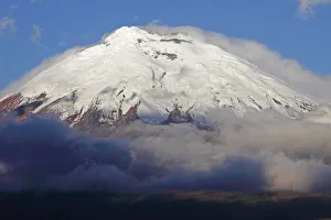 Snow-covered summit of Cotopaxi volcano rising from a cloud cover, Cotopaxi Province Snow-covered summit of Cotopaxi volcano rising from a cloud cover, Cotopaxi Province