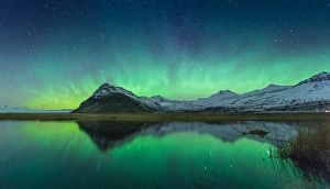 Snow mountain with northern light background Snow mountain with northern light background