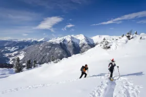 Snowshoe walkers during the ascent of the Mt Morgenrast summit from Unterreinswald Snowshoe walkers during the ascent of the Mt Morgenrast summit from Unterreinswald