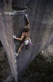 Sports climber on the difficult Avalon route in Unterabtsteinach, Odenwald, Hesse Sports climber on the difficult Avalon route in Unterabtsteinach, Odenwald, Hesse