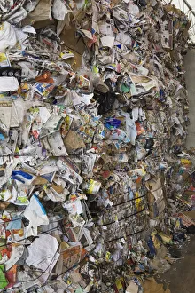 Stacked bales of recyclable cardboard and paper at a sorting centre, Quebec, Canada Stacked bales of recyclable cardboard and paper at a sorting centre, Quebec, Canada