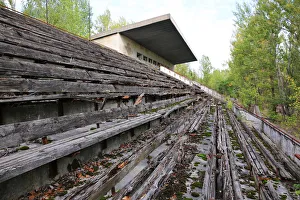 Empty stands of abandoned stadium in Pripyat city near Chernobyl Empty stands of abandoned stadium in Pripyat city near Chernobyl