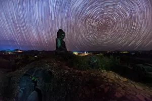 Images Dated 19th December 2014: Startrails over old ruins of Buddha statues