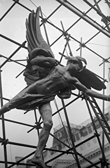 <b class=qtipBold><figcaption>The Statue Returns</figcaption></b><br>30th June 1947: The statue of Eros being moved back to Piccadilly in London after the war. (Photo by Harold Clements/Express/Getty Images)<br><em>© This content is subject to copyright.</em> The Statue Returns