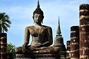 Legs Crossed At Knee Gallery: Statue with stupa Wat Mahathat temple Sukhothai Thailand, Asia