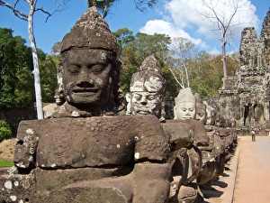 Statues on bridge at Angkor Thom South gate, towards the Bayon Temple, Siem Reap, Cambodia Statues on bridge at Angkor Thom South gate, towards the Bayon Temple, Siem Reap, Cambodia
