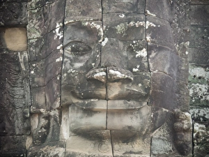 Stone Craft of Smile face at Bayon temple, the Temple of a Thousand Faces at Angkor in Stone Craft of Smile face at Bayon temple, the Temple of a Thousand Faces at Angkor in
