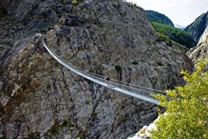 Stressed-ribbon bridge across Massa Gorge, Belalp tourism region, Canton of Valais Stressed-ribbon bridge across Massa Gorge, Belalp tourism region, Canton of Valais