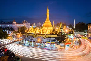 Sule Pagoda place for worship and traffic circle Roundabout Sign in Yangon , Myanmar Sule Pagoda place for worship and traffic circle Roundabout Sign in Yangon , Myanmar
