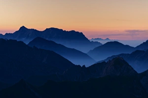 Sunrise above the Allgau Alps with peaks in steplike arrangement, Oberstdorf, Bavaria Sunrise above the Allgau Alps with peaks in steplike arrangement, Oberstdorf, Bavaria