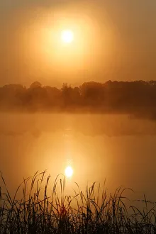 Sunrise, autumn fog over Big Rock Lake near Detroit Lakes, Minnesota, USA Sunrise, autumn fog over Big Rock Lake near Detroit Lakes, Minnesota, USA