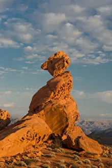 Sunset on Balancing Rock with clouds in background, Valley of Fire State Park, Nevada, USA Sunset on Balancing Rock with clouds in background, Valley of Fire State Park, Nevada, USA