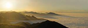 Sunset, peaks of the Alpine foothills in fog, Benediktenwand, near Garmisch-Partenkirchen Sunset, peaks of the Alpine foothills in fog, Benediktenwand, near Garmisch-Partenkirchen