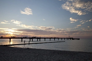 Sunset, pier, Baltic Sea resort town of Zingst, Mecklenburg-Western Pomerania, Germany Sunset, pier, Baltic Sea resort town of Zingst, Mecklenburg-Western Pomerania, Germany