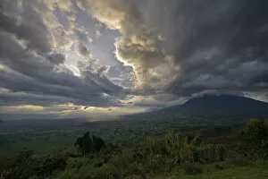 Related Images Gallery: Sunset over the Virunga Mountains of the Volcanoes National Park in Rwanda with the rural settlements dotting the landscape