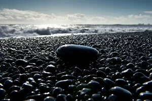 Gravel Gallery: Surf, black pebbles on the lava beach of Reynisfjara near Vik i Myrdal, South Coast, Iceland