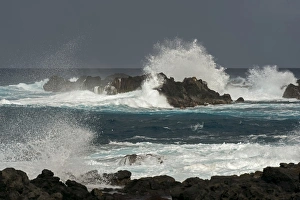 Surf on the coast during an approaching storm over the Pacific, Easter Island, Chile Surf on the coast during an approaching storm over the Pacific, Easter Island, Chile