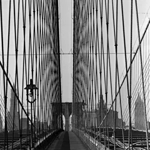 <b class=qtipBold><figcaption>Suspension Wires</figcaption></b><br>circa 1955: The steel wires which suspend the roadway on Brooklyn Bridge, New York, designed by engineer John Roebling. (Photo by Three Lions/Getty Images)<br><em>© This content is subject to copyright.</em> Suspension Wires