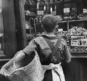 <b class=qtipBold><figcaption>Sweet Shopping</figcaption></b><br>1951: A young Spanish boy gazes at the sweets in a shop window. Original Publication: Picture Post - 6277 - Inside Spain: Spanish Children - pub. 1951 (Photo by Daniel Farson/Picture Post/Getty Images) Sweet Shopping