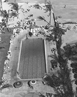 Swimming pool at seashore, (B&W), elevated view Swimming pool at seashore, (B&W), elevated view