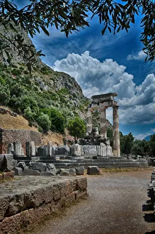 <b class=qtipBold><figcaption>Tholos of Athena Pronaia 2</figcaption></b><br>Tholos is perhaps the most characteristic monument of Delphi, which dominates the sanctuary of Athena Pronaia between the newest temple of Athena and the treasure of Massalioton. This masterpiece of classical architecture, which, however, ignore the use. Has been associated with chthonic cult, however, Pausanias, who saw the ruins of the 2nd century. A.D. not to mention as a temple. The impressive circular building dating to 380 BC As we learn from Vitruvius, the architect responsible for the construction of the dome was Theodore from Phocea or Phocis, who, indeed, had written a book on how it was built.<br><em>© Tilis</em> Tholos of Athena Pronaia 2