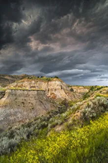 Thunderstorm approaching on Dakota prairie, Theodore Roosevelt National Park, North Dakota, USA Thunderstorm approaching on Dakota prairie, Theodore Roosevelt National Park, North Dakota, USA