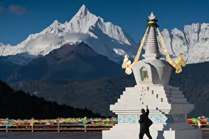 Tibetan stupa and snowy Meili Xue Shan peak Tibetan stupa and snowy Meili Xue Shan peak