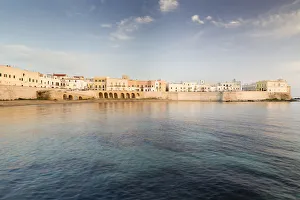 Town beach and historic centre in the evening light, Gulf of Taranto, Gallipoli, Province of Lecce, Apulia, Italy Town beach and historic centre in the evening light, Gulf of Taranto, Gallipoli, Province of Lecce, Apulia, Italy