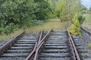 Tracks running into the countryside at a disused railway station on a regional route from Marburg - Erdtebrueck Tracks running into the countryside at a disused railway station on a regional route from Marburg - Erdtebrueck