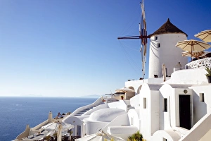 Traditional windmill in Oia, Santorini, Greece Traditional windmill in Oia, Santorini, Greece