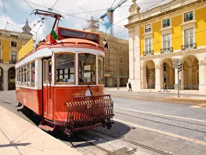 A tram in Praca do Comercio square A tram in Praca do Comercio square