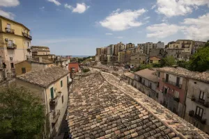 Prints of A view of Corigliano Calabro from rooftops looking down and out to sea Travel Imagery Prints: Corigliano Calabro Rooftop Print: Coastal View