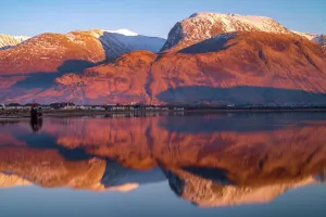 Prints of Last light on the famous Ben Nevis mountain with Loch Eilch. Taken from Corpach looking towards Inverlochy and Lochybridge with Fort William just to the right. Scottish Highlands Travel Photographer Collection Prints: Ben Nevis Sunset Print: Loch Eilch Reflections