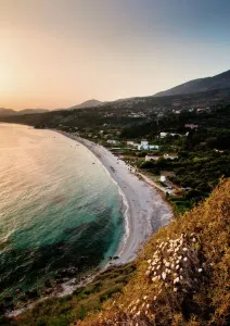 Travel Photography From John And Tina Reid Prints: Lourdas Beach Print: Warm Sunset Glow on Kefalonia