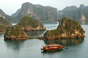 Twilight over the island world of the UNESCO-declared world natural heritage Halong Bay Twilight over the island world of the UNESCO-declared world natural heritage Halong Bay