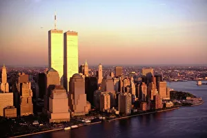 <b class=qtipBold><figcaption>Twin Towers Manhattan</figcaption></b><br>This is an aerial view of the twin towers world trade center at dusk, looking east taken from above the Hudson river.<br><em>© Jerry Trudell</em> Twin Towers Manhattan