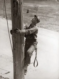 Utility Worker Man Is Climbing Electric Power Utilities Pole Utility Worker Man Is Climbing Electric Power Utilities Pole