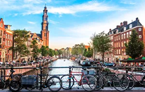 <b class=qtipBold><figcaption>View of canal in Amsterdam</figcaption></b><br>View of canal in Amsterdam, Holland. Amstel river, canal, and bicycles.<br><em>© 2018 Gustavo Muniz</em> View of canal in Amsterdam
