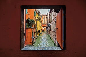 Idyllic Gallery: View to the canal through square window, Bologna, Emilia-Romagna, Italy
