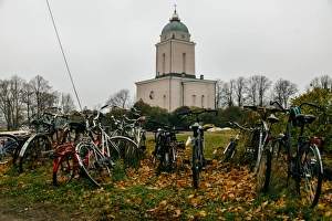 View on Suomenlinna Church with parked bicycles on a foreground, Finland View on Suomenlinna Church with parked bicycles on a foreground, Finland