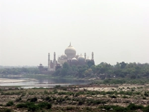 <b class=qtipBold><figcaption>View of Taj Mahal, Agra, India</figcaption></b><br>UNESCO World Heritage Site and one of the wonders of the world 'The Taj Mahal' is a white marble mausoleum located on the southern bank of the Yamuna River in the Indian city of Agra. It was commissioned in 1632 by the Mughal emperor Shah Jahan (reigned 1628a1658) to house the tomb of his favorite wife of three, Mumtaz Mahal. View of Taj Mahal, Agra, India
