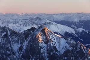 View from Zugspitze Mountain over Hochwanner Mountain, 2744m asl, in the evening light View from Zugspitze Mountain over Hochwanner Mountain, 2744m asl, in the evening light