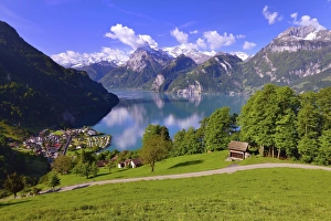 Views of Sisikon and Urnersee lake, part of Lake Lucerne, Swiss Path, Uri Alps or Urner Alps in Central Switzerland with the mountains Brunnistock, Uri-Rotstock and Oberbauenstock, Canton of Uri, Switzerland Views of Sisikon and Urnersee lake, part of Lake Lucerne, Swiss Path, Uri Alps or Urner Alps in Central Switzerland with the mountains Brunnistock, Uri-Rotstock and Oberbauenstock, Canton of Uri, Switzerland