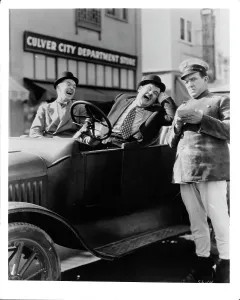 Laurel And Hardy Prints: Stan Laurel and Oliver Hardy Leave Em Laughing Print 1928